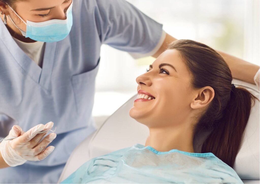 Patient discussing porcelain veneer costs and treatment options with a cosmetic dentist during a consultation.
